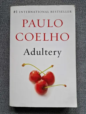 A book with a pair of cherries on its cover